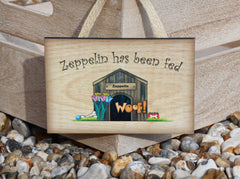 Dog has been fed hanging rustic wooden sign at Honeymellow