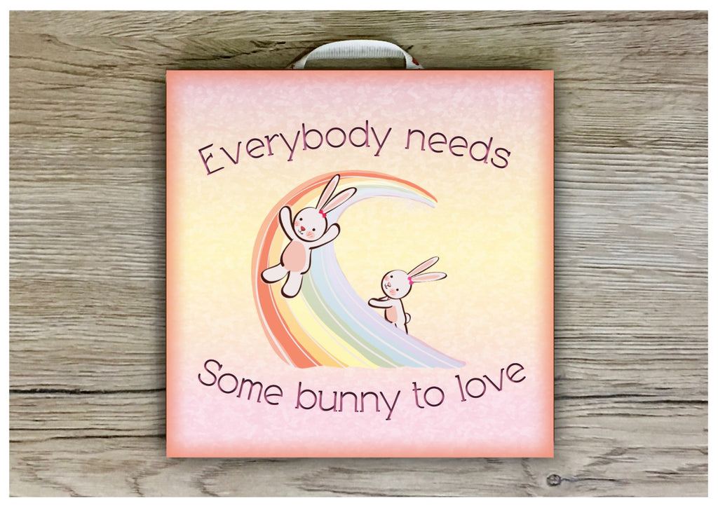 Everybody needs some bunny to love quote or add your own text to our metal or wood sign.  Handmade at www.honeymellow.com