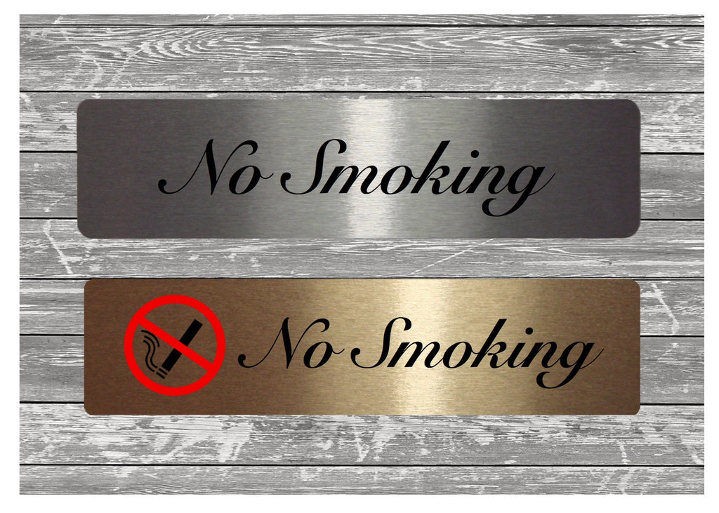 NO SMOKING Sign in brushed silver or gold metal at Honeymellow