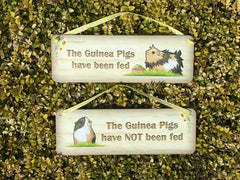 The Guinea Pigs have been fed personalised reversible hanging sign: handmade at www.honeymellow.com