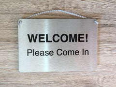 Add your text to double-sided hanging metal sign in brushed silver, gold or white.  Custom-made at honeymellow.com 