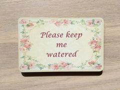 Blank flower with pink wildflowers on beige wood or metal sign; custom-made with your text at www.honeymellow.com